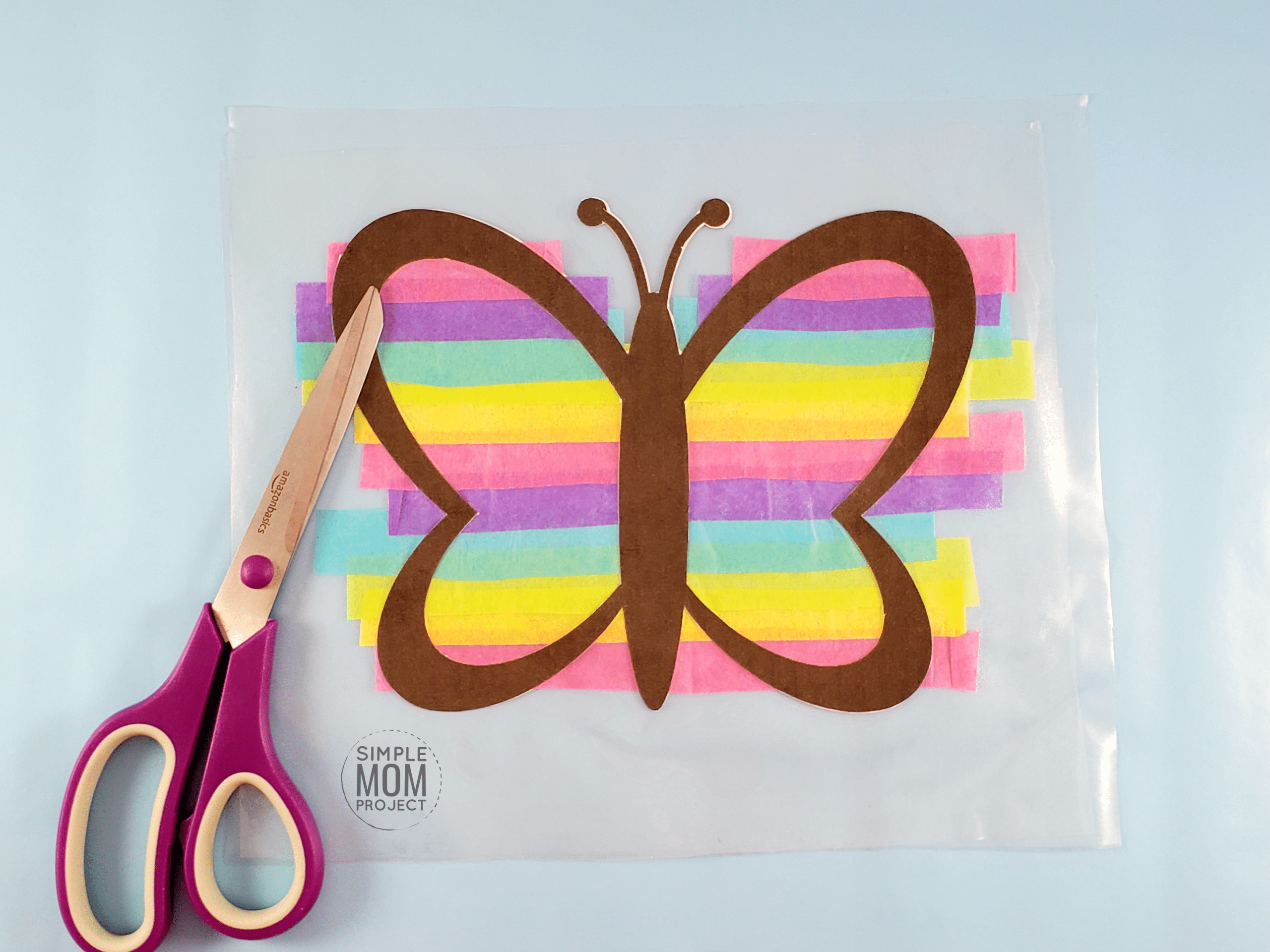 Print your FREE template and give your windows a fun stained glass effect with this easy, DIY Spring Butterfly Suncatcher craft! Great for kids, toddlers and adults! #Spring #springcrafts #SpringCrafts #ButterflyCrafts