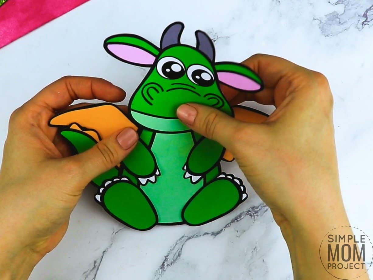 Free printable dragon coloring page template for kids, preschoolers and kindergartners