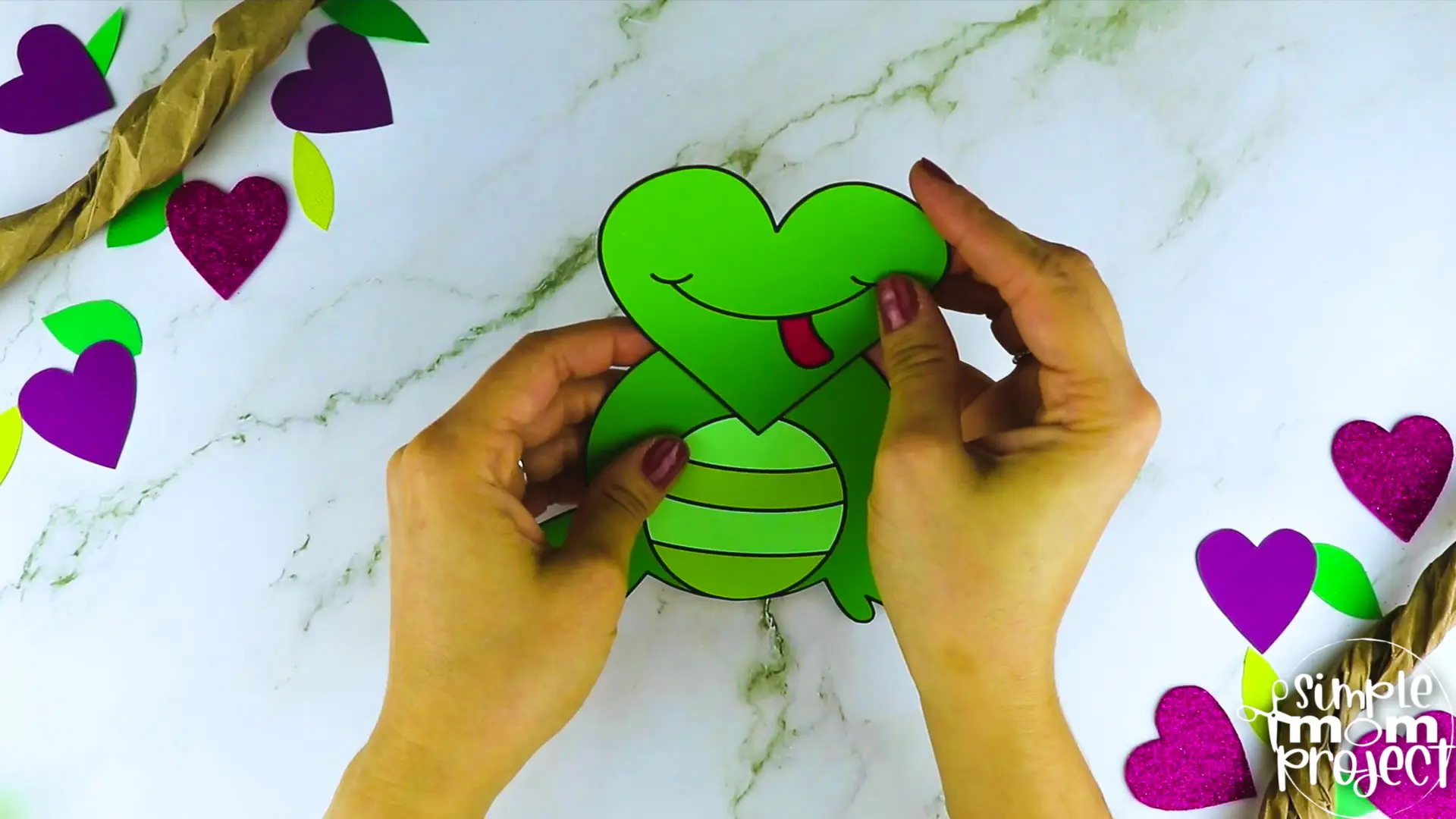 Are you looking for a simple heart shaped craft template for your kids? This adorable cut and paste heart frog craft is perfect for you! Your kids will enjoy coloring, cutting and sticking together the printable heart frog patterns. Whether you use this as creative art projects for toddlers, preschoolers or kindergartners or to learn about frogs during homeschooling, this cut and paste heart-shaped frog craft is a great fun for everyone!