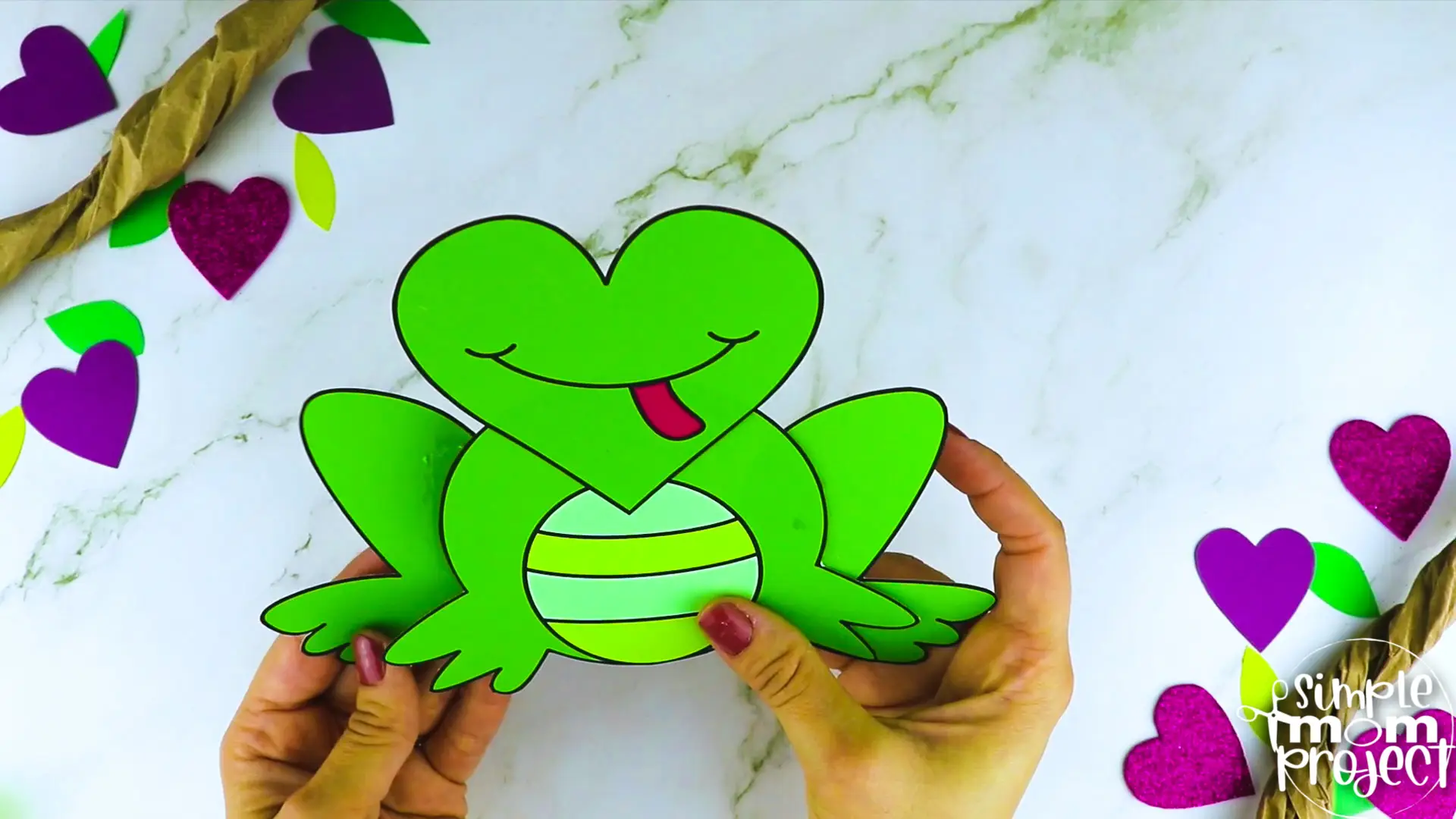 Are you looking for a simple heart shaped craft template for your kids? This adorable cut and paste heart frog craft is perfect for you! Your kids will enjoy coloring, cutting and sticking together the printable heart frog patterns. Whether you use this as creative art projects for toddlers, preschoolers or kindergartners or to learn about frogs during homeschooling, this cut and paste heart-shaped frog craft is a great fun for everyone!