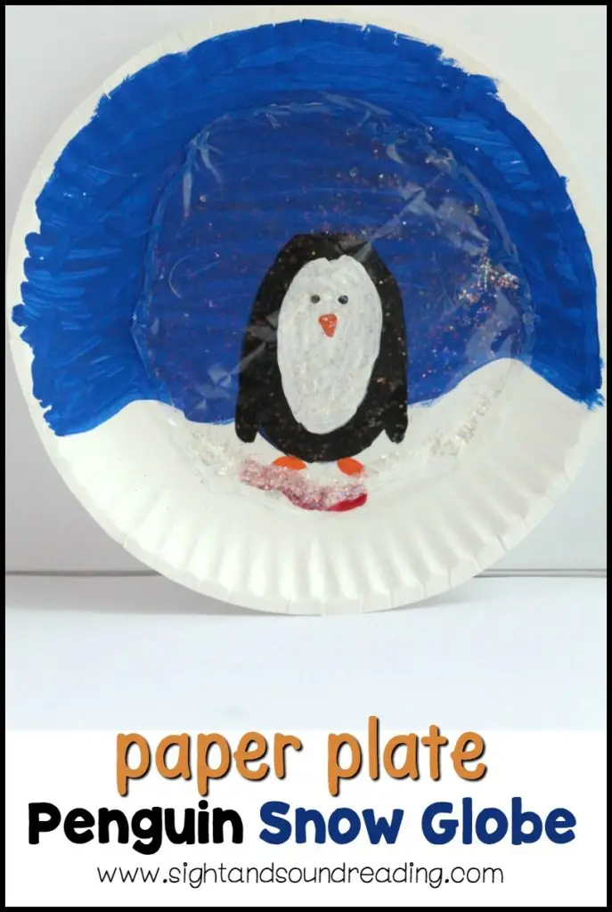 paper plate penguin snow globe